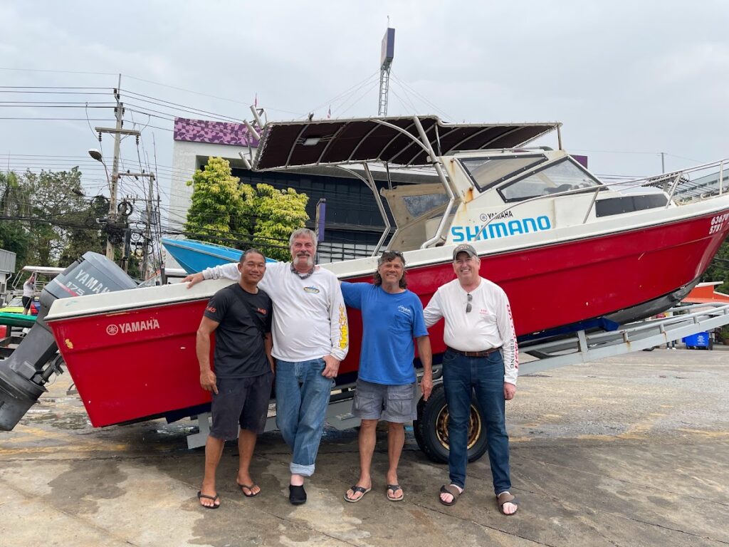 picture showing our charter boat and Dale Jenkins, Jeff Hass,Guy Wann