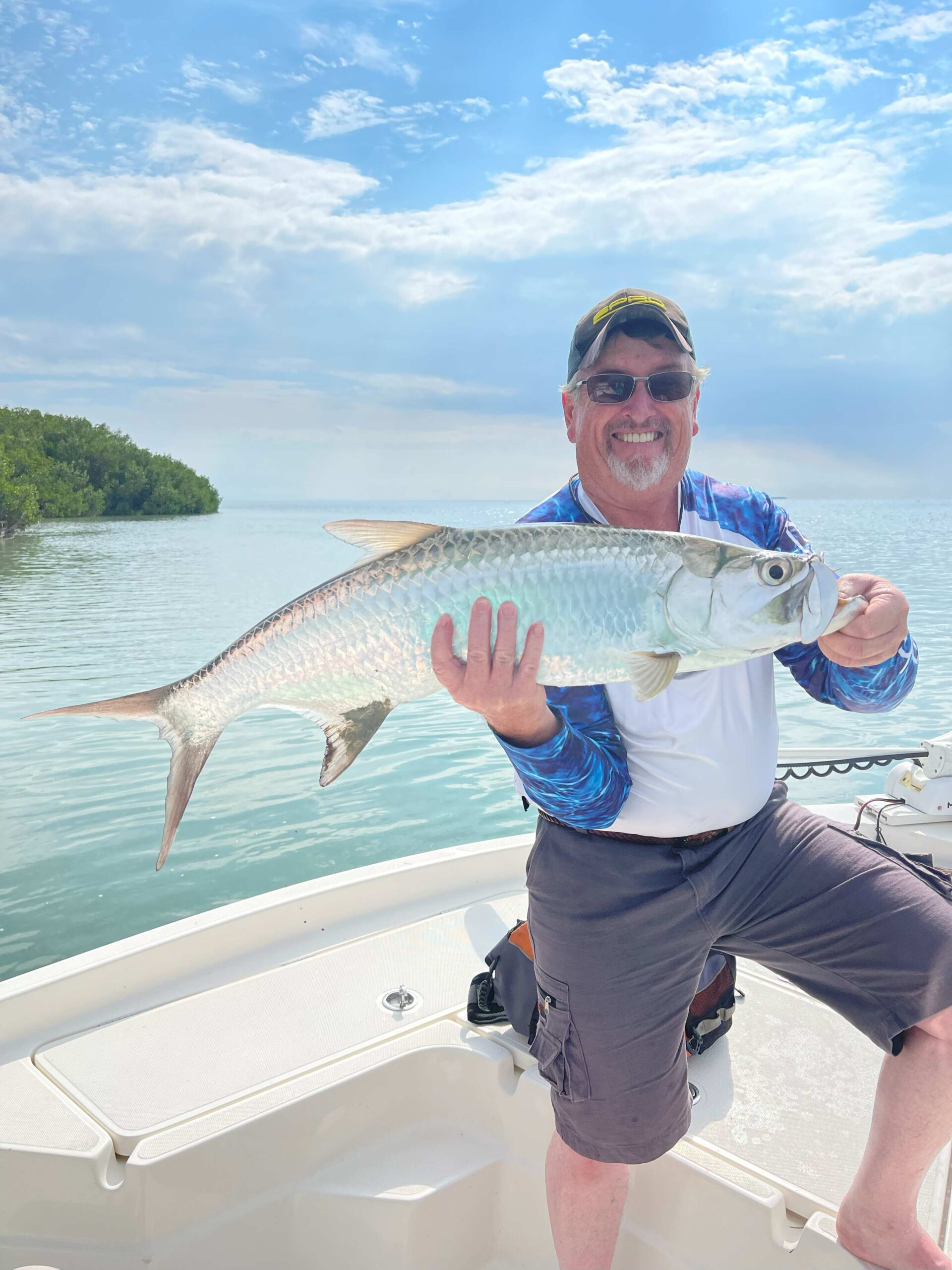 Guy Wann showing a large Tarpon Sport Fish